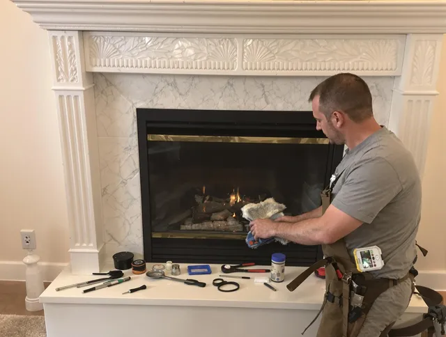 Gahanna Chimney Sweep performing fireplace maintenance in Gahanna, OH